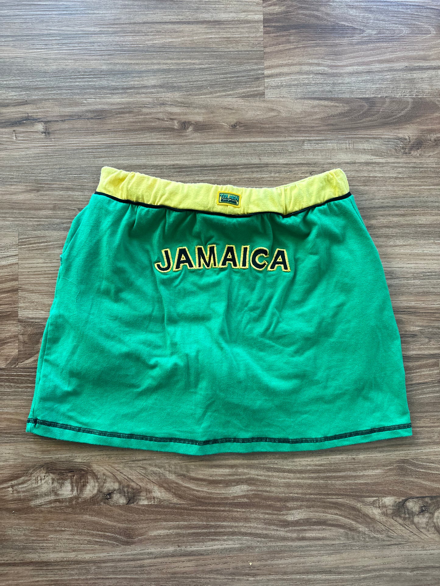 Vintage 2000s green “Jamaica” fitted mini skirt